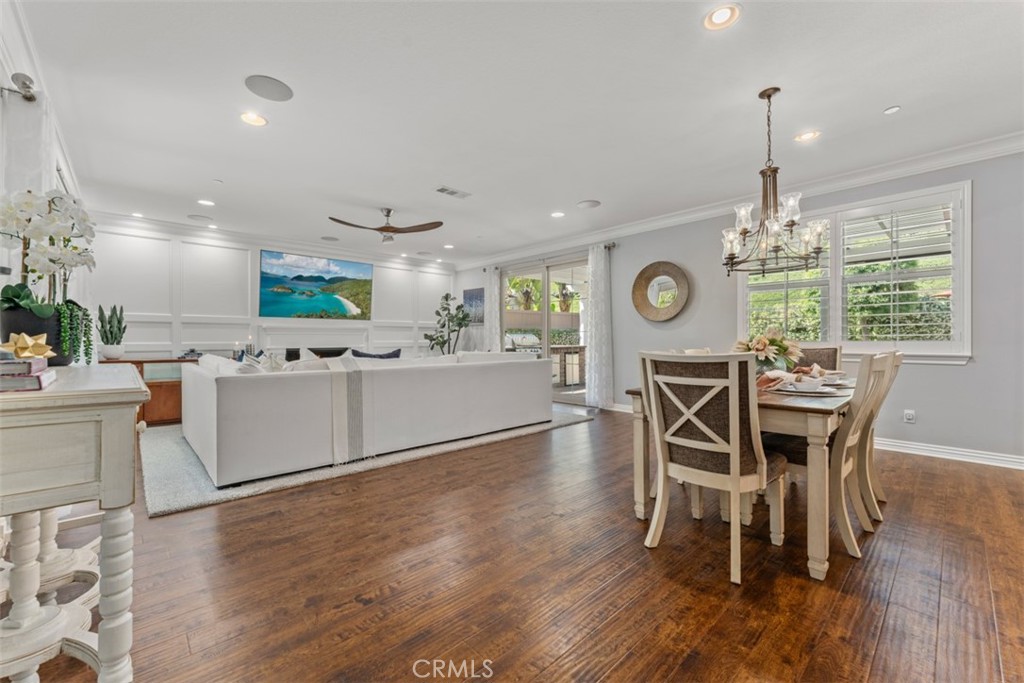 23 Vivido Street Rancho Mission Viejo, CA 92694 - Photo 9 of 44 a dining room with furniture a window and wooden floor