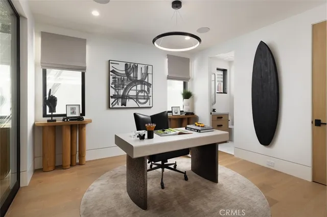 a view of a workspace with furniture