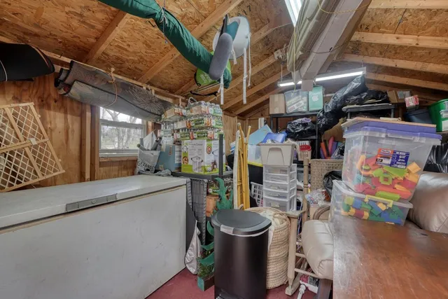 an aerial view of a house with outdoor space