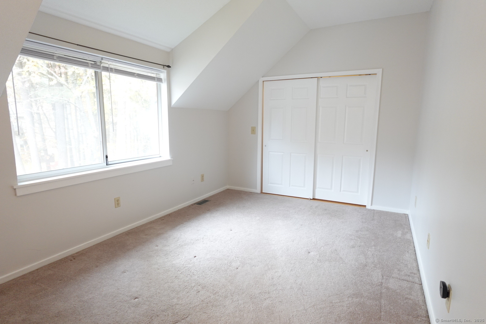 17 Pepperidge Court, Unit 17 Simsbury, CT 06070 - Photo 12 of 20 an empty room with a window