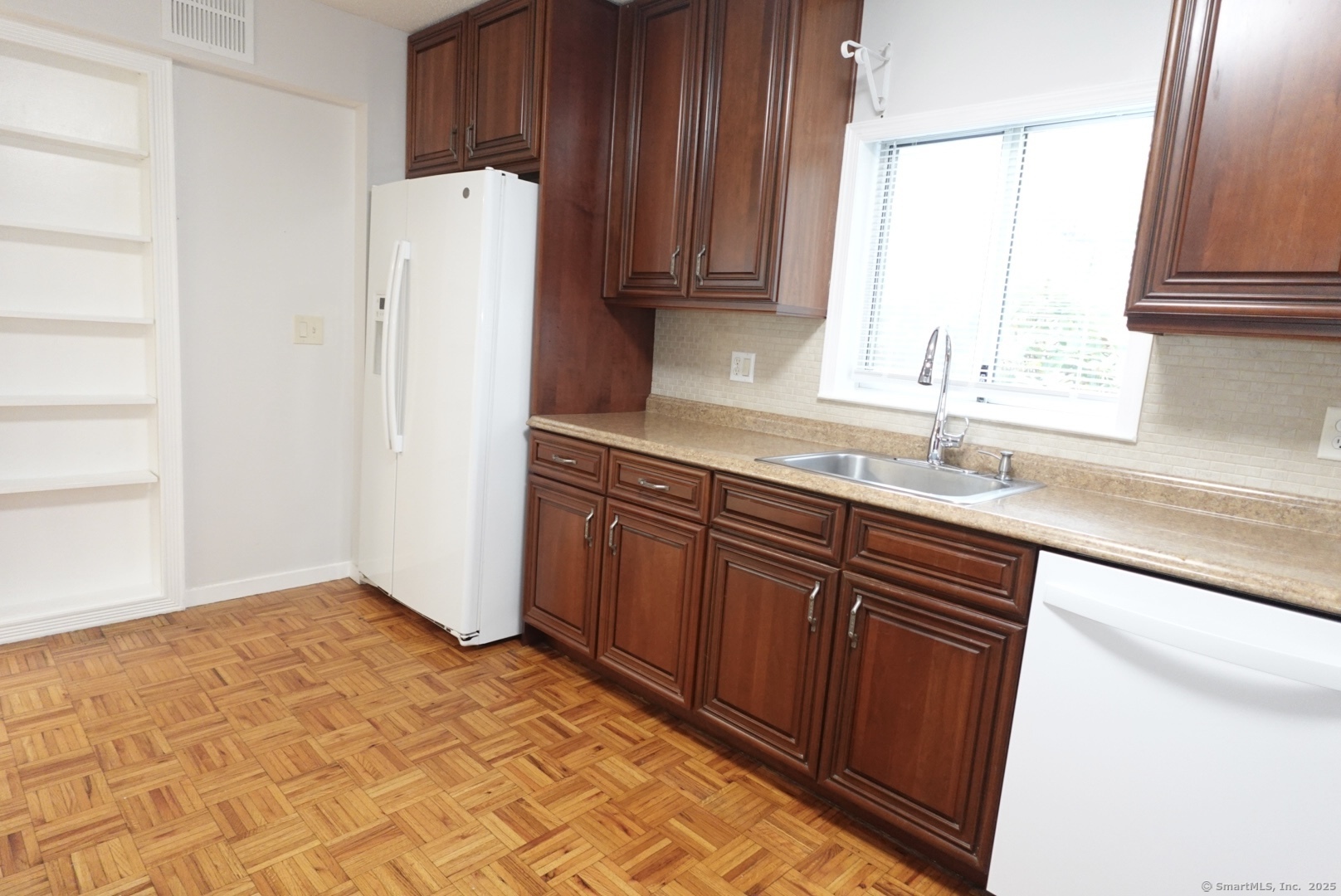 17 Pepperidge Court, Unit 17 Simsbury, CT 06070 - Photo 18 of 20 a kitchen with stainless steel appliances granite countertop a refrigerator and a sink