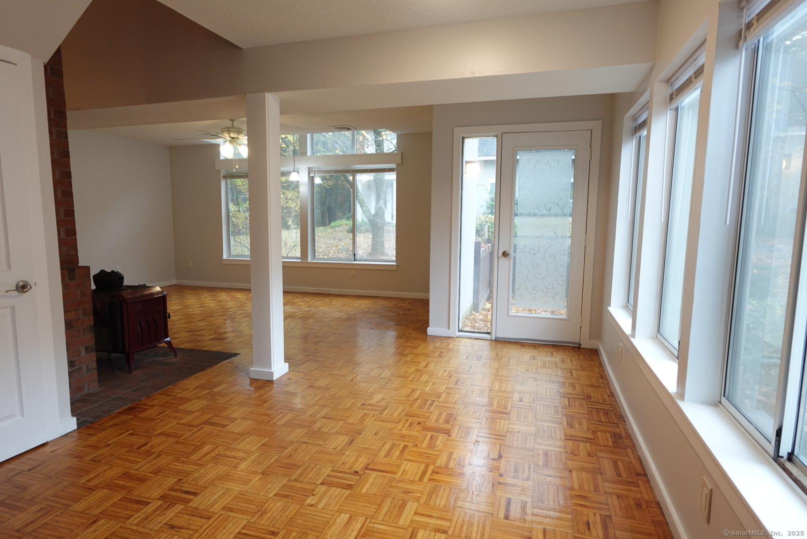 17 Pepperidge Court, Unit 17 Simsbury, CT 06070 - Photo 4 of 20 a view of a hallway with bathroom and glass door