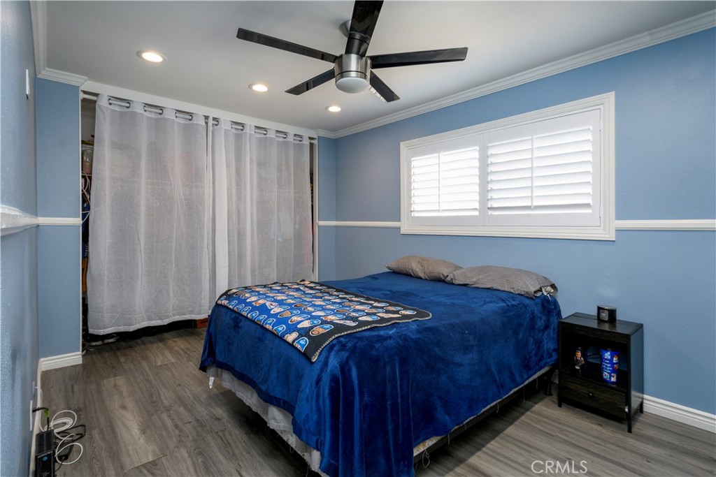 1709 Paramount Boulevard Montebello, CA 90640 - Photo 12 of 19 a bedroom with a bed and a window