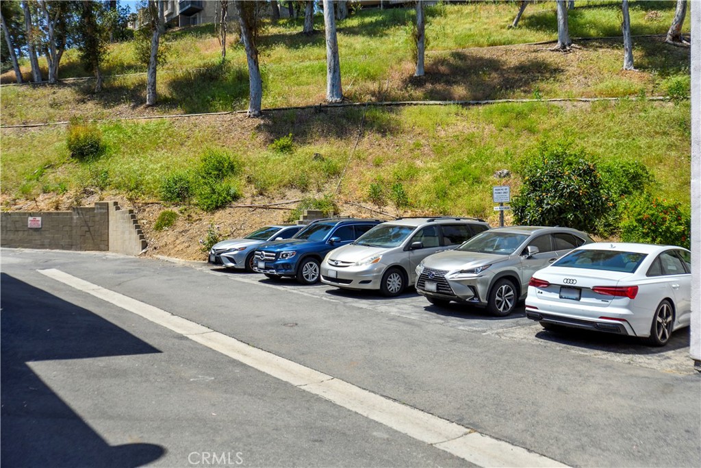 1709 Paramount Boulevard Montebello, CA 90640 - Photo 16 of 19 a view of cars parked on the street side