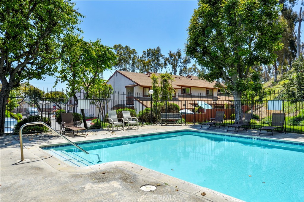 1709 Paramount Boulevard Montebello, CA 90640 - Photo 19 of 19 a front view of a house with garden and trees