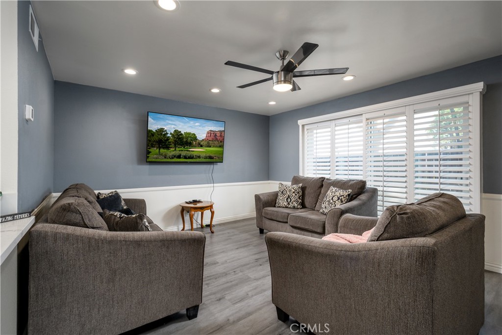 1709 Paramount Boulevard Montebello, CA 90640 - Photo 2 of 19 a living room with furniture and a large window