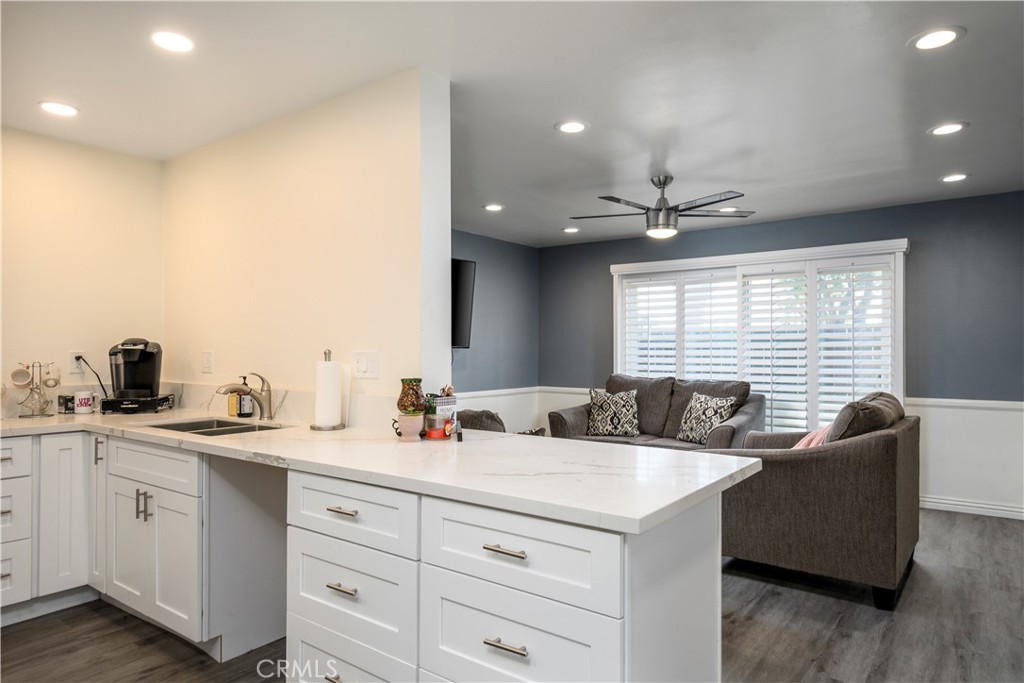 1709 Paramount Boulevard Montebello, CA 90640 - Photo 6 of 19 a view of center island a sink a window and a couch