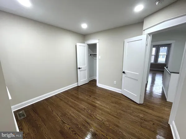 a bathroom with a toilet a sink and bathtub