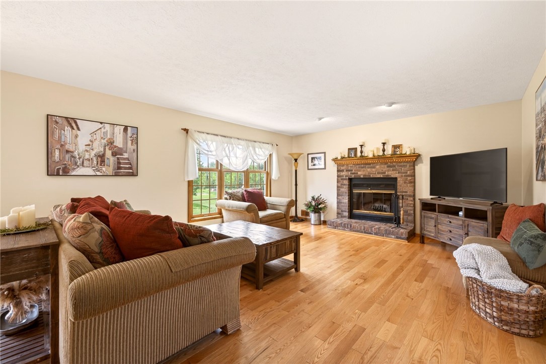 3249 Big Ridge Road Ogden, NY 14559 - Photo 12 of 50 Great room view to fireplace.