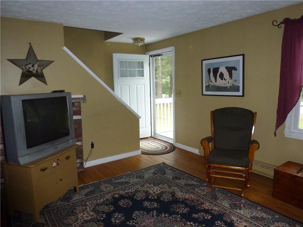 91 North Berwick Road Wells, ME 04090 - Photo 11 of 18 Front door entry into living room.