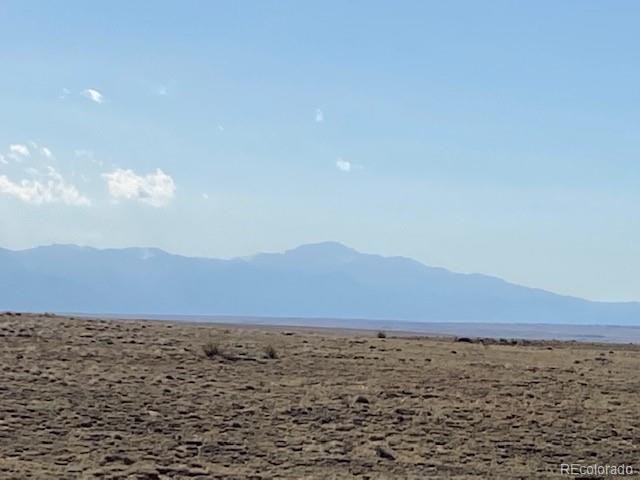 80864 Usa Yoder, CO 80864 - Photo 1 of 8 a view of an ocean beach and mountain