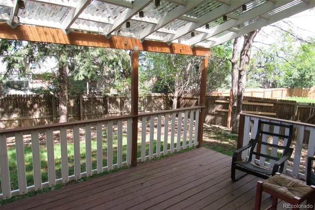 a porch with wooden floor in outdoor space