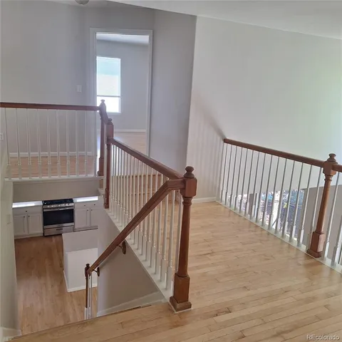 a view of entryway with wooden floor