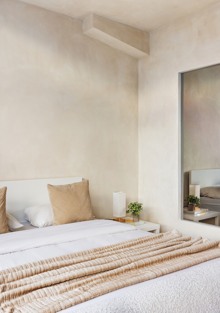 100 11th Avenue, Unit 3C Manhattan, NY 10011 - Photo 3 of 8 a bedroom with a bed and a couch