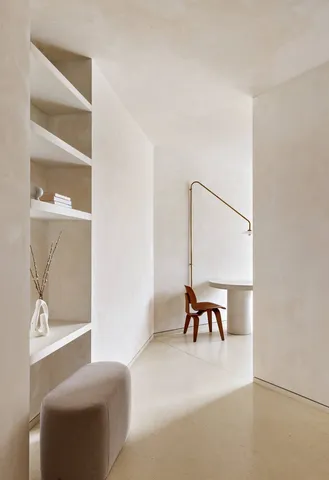 a view of a balcony with chair and table