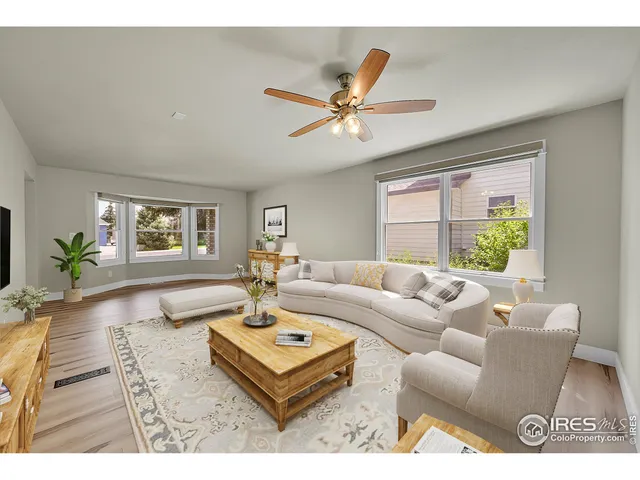 a view of a dining room with furniture and a fireplace