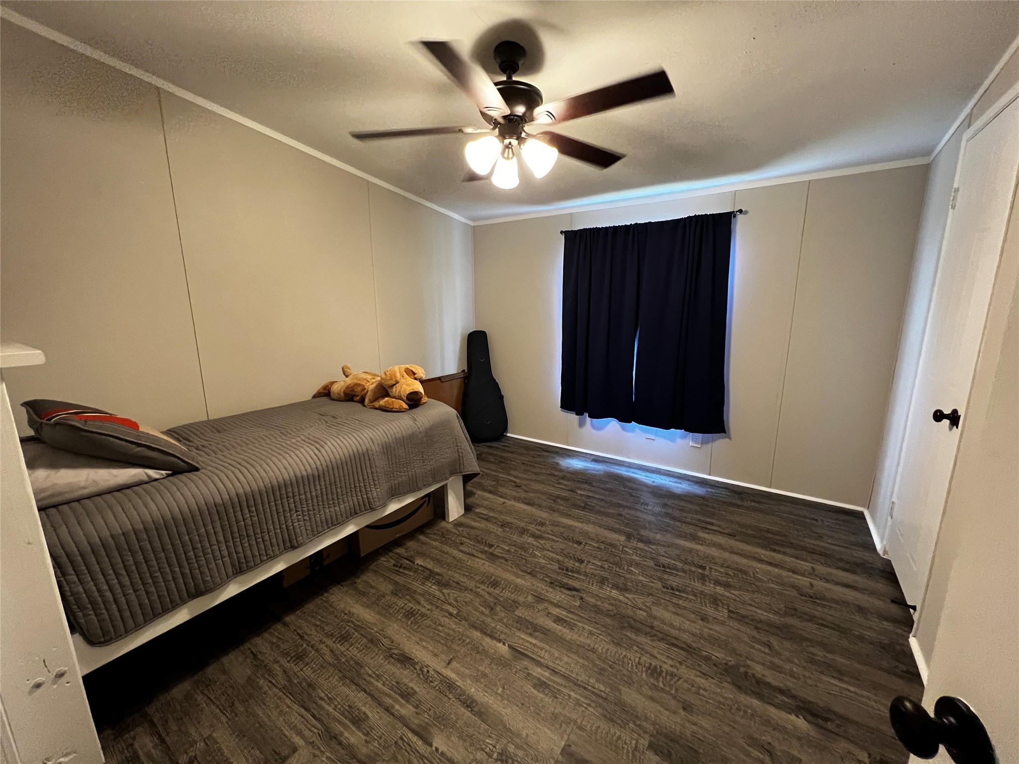 2346 Pr 1105 Midway, TX 75850 - Photo 19 of 25 a bed room with a bed and a ceiling fan