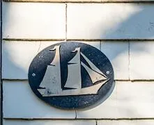 a view of a chairs on the roof deck