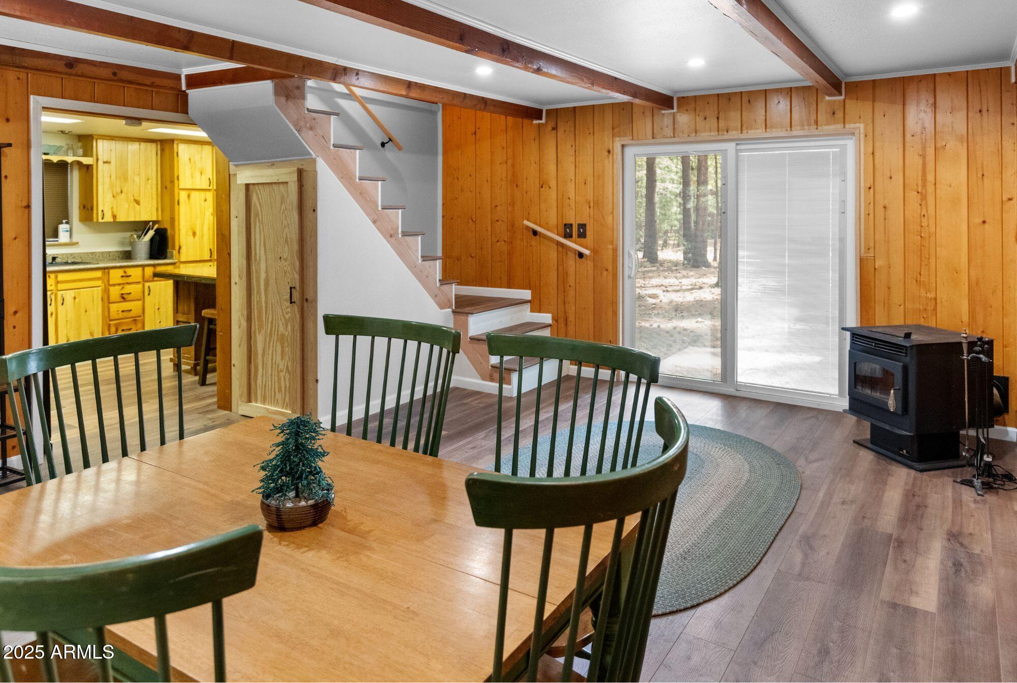 2524 Old Rim Road Forest Lakes, AZ 85931 - Photo 13 of 44 a view of a dining room with furniture window and wooden floor