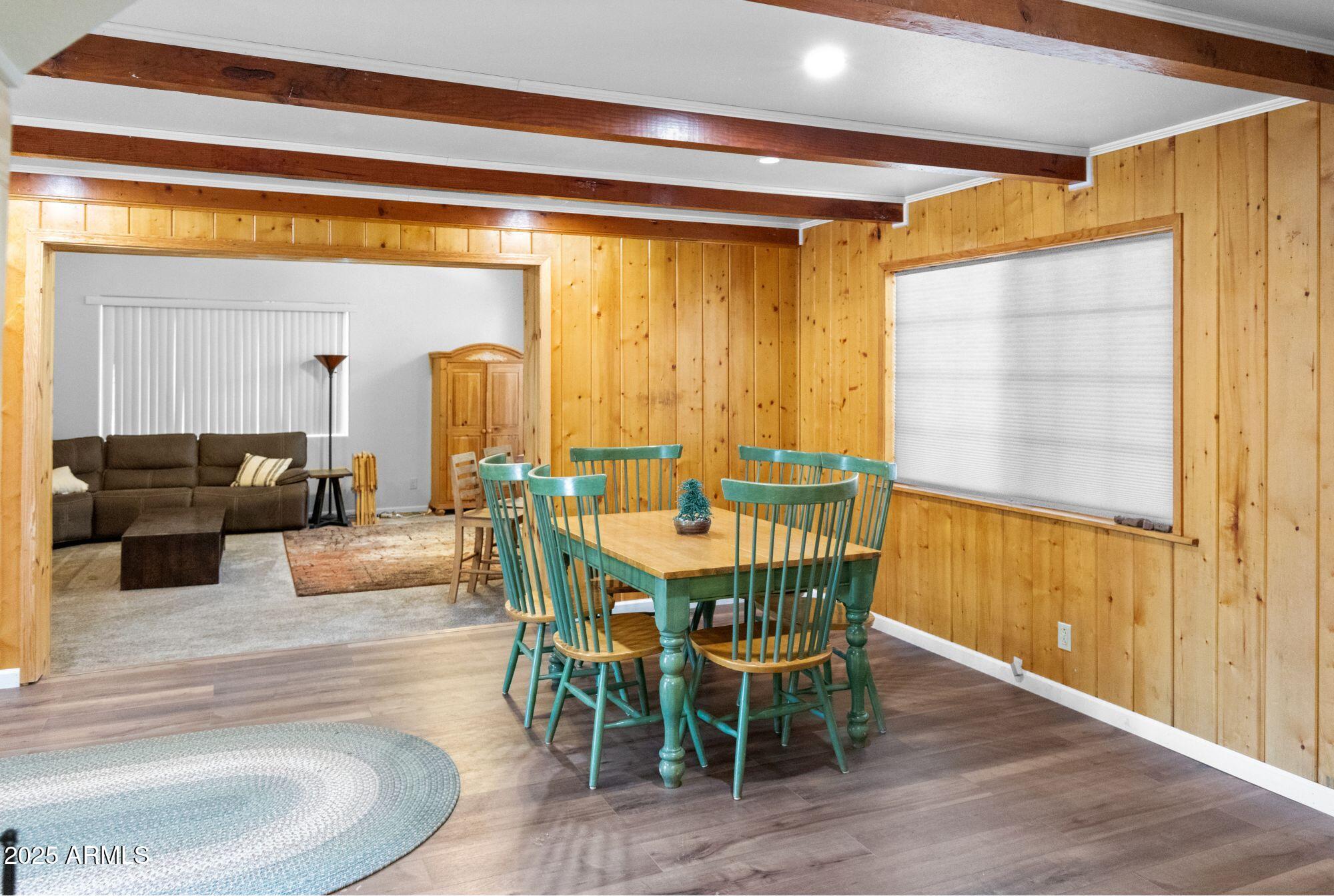 2524 Old Rim Road Forest Lakes, AZ 85931 - Photo 14 of 44 a view of a dining room with furniture and wooden floor