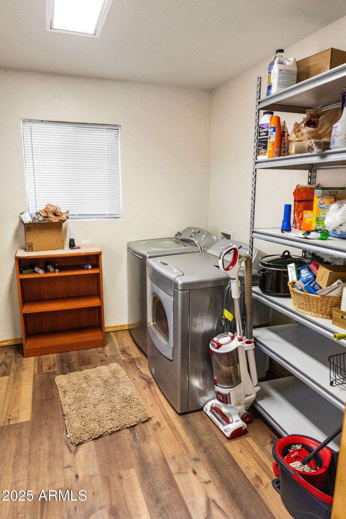 2524 Old Rim Road Forest Lakes, AZ 85931 - Photo 17 of 44 a storage room with washer and dryer