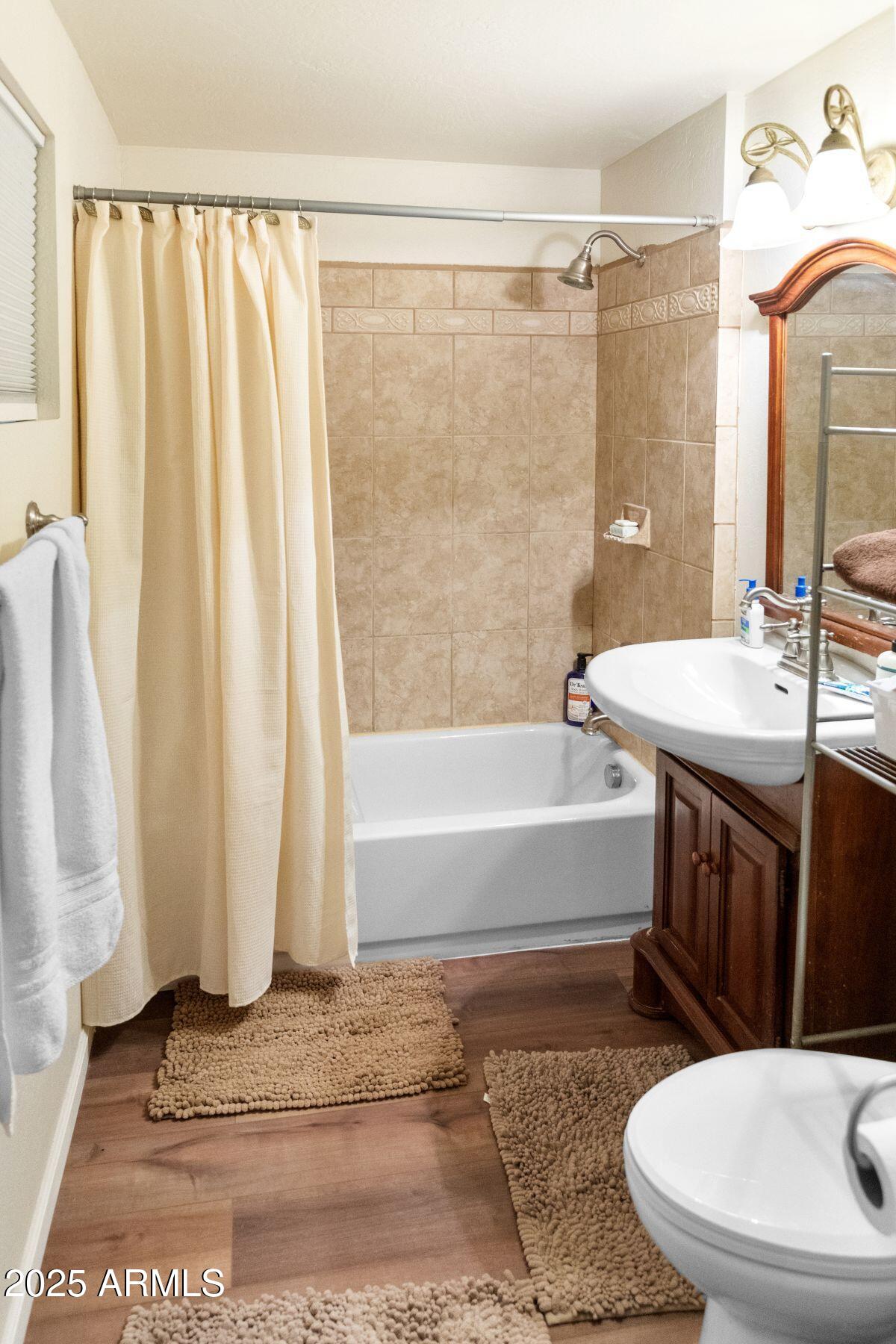 2524 Old Rim Road Forest Lakes, AZ 85931 - Photo 18 of 44 a bathroom with a sink and mirror