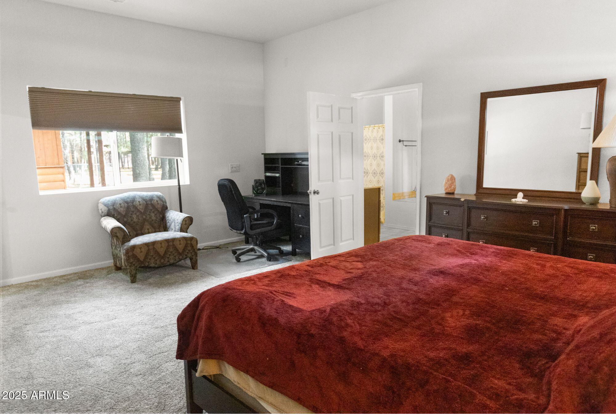 2524 Old Rim Road Forest Lakes, AZ 85931 - Photo 24 of 44 a bedroom with a bed and a couch