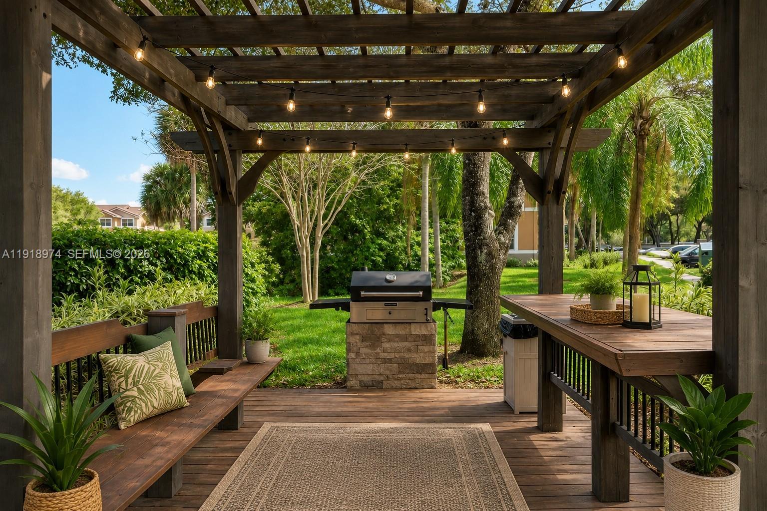 8801 Wiles Road, Unit 307 Coral Springs, FL 33067 - Photo 18 of 18 a view of a patio with table and chairs potted plants with floor to ceiling window plants and garden