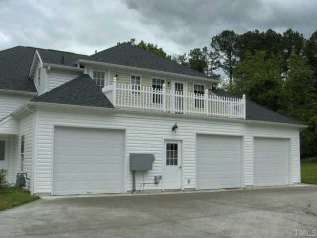 3803 Cole Mill Road Durham, NC 27712 - Photo 8 of 8 View of garage showing balcony area accessable from each 2nd floor bedroom Other
