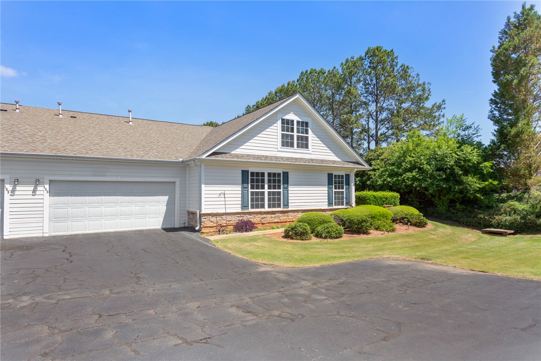 155 Life Style Lane Anderson, SC 29621 - Photo 49 of 49 This charming home offers classic appeal with a durable asphalt roof and an attached garage.