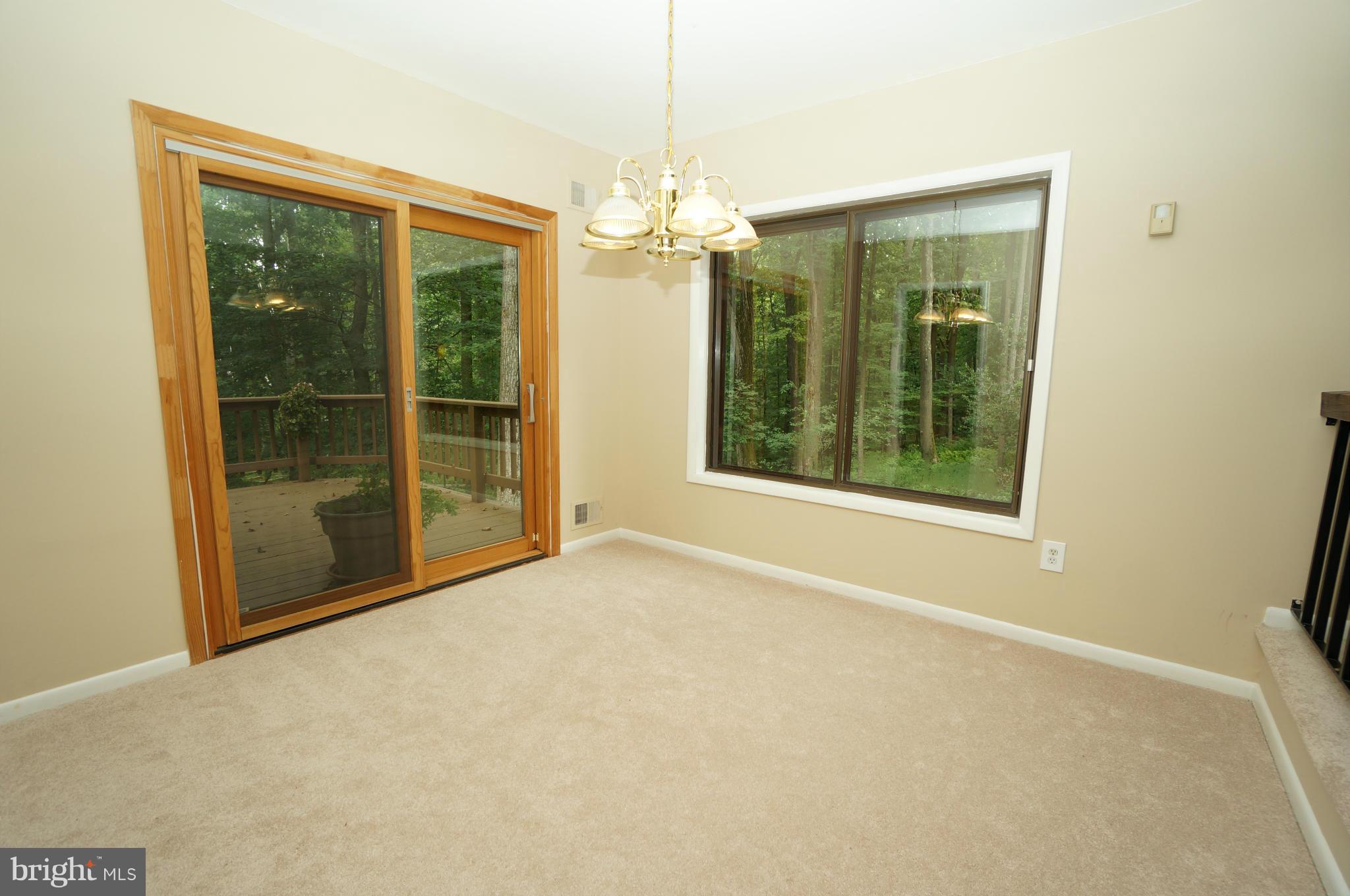 10975 Swansfield Road Columbia, MD 21044 - Photo 10 of 30 Dining Room Pella Slider