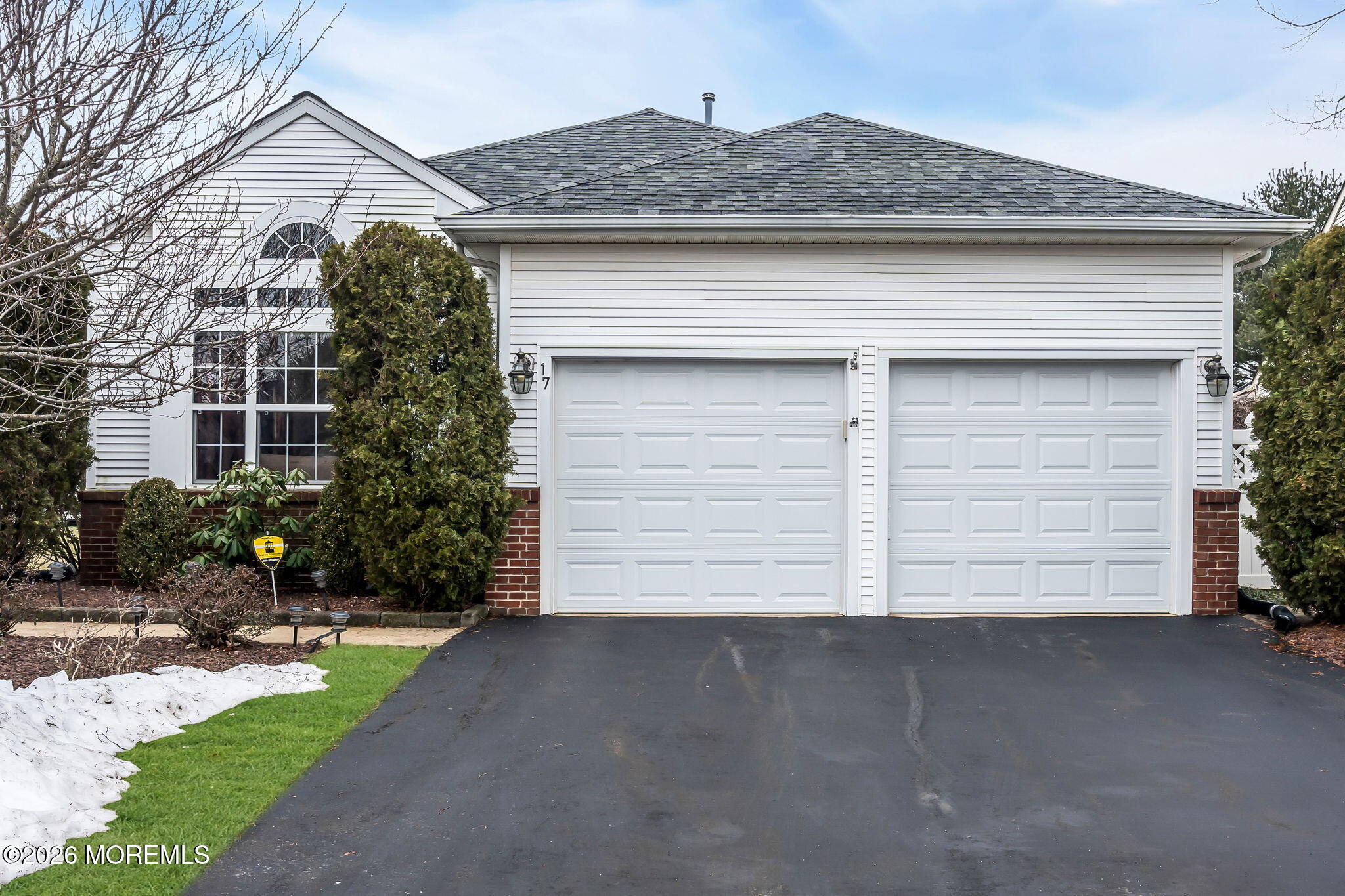 17 Rochford Drive Manchester Township, NJ 08759 - Photo 1 of 55 a front view of a house with a yard and garage