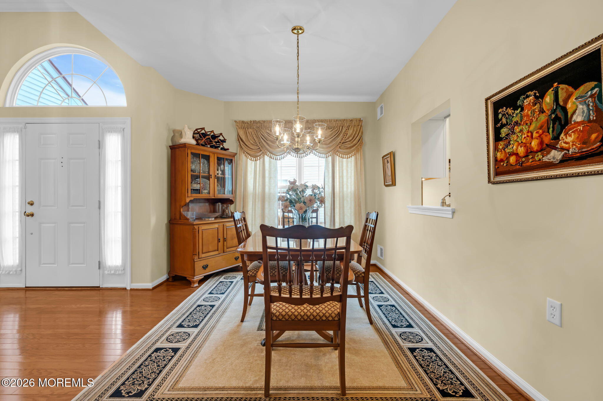 17 Rochford Drive Manchester Township, NJ 08759 - Photo 13 of 55 a dining room with furniture a rug and wooden floor