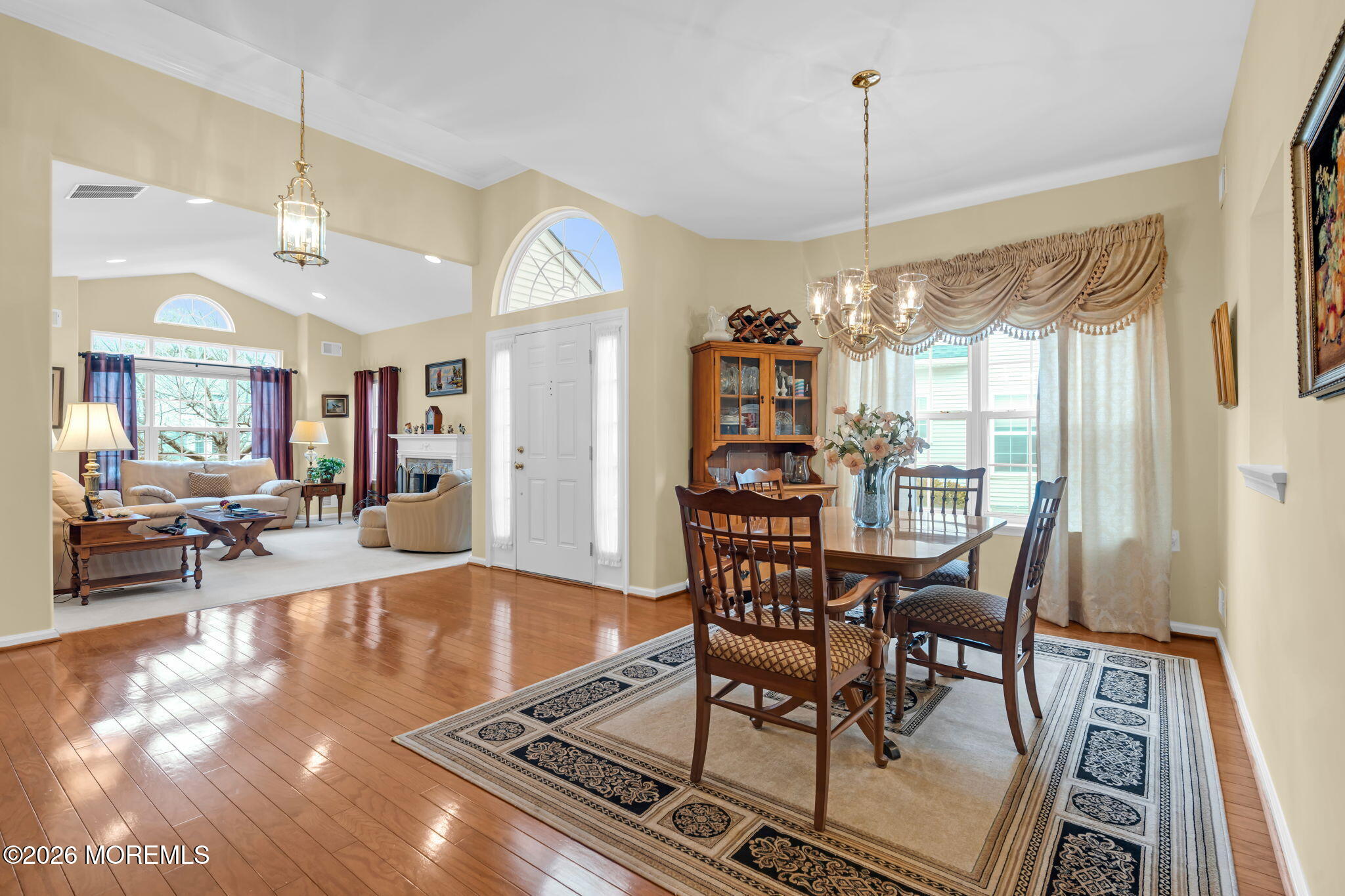 17 Rochford Drive Manchester Township, NJ 08759 - Photo 14 of 55 a dining room with furniture a chandelier and wooden floor