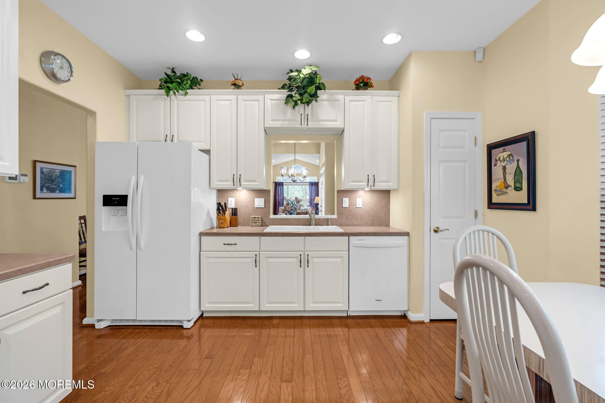 17 Rochford Drive Manchester Township, NJ 08759 - Photo 15 of 55 a kitchen with kitchen island granite countertop cabinets and refrigerator