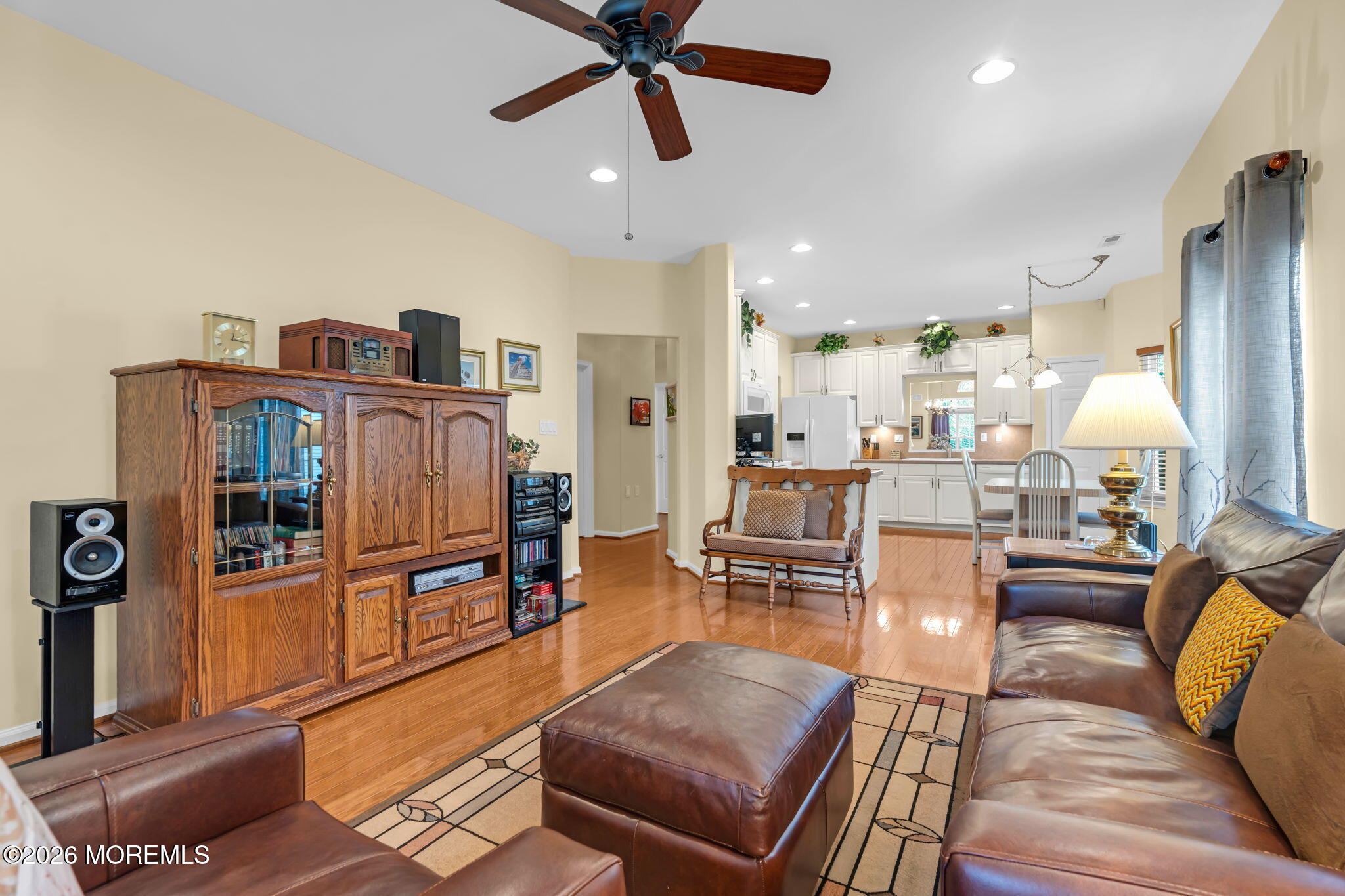 17 Rochford Drive Manchester Township, NJ 08759 - Photo 23 of 55 a living room with furniture kitchen view and a wooden floor