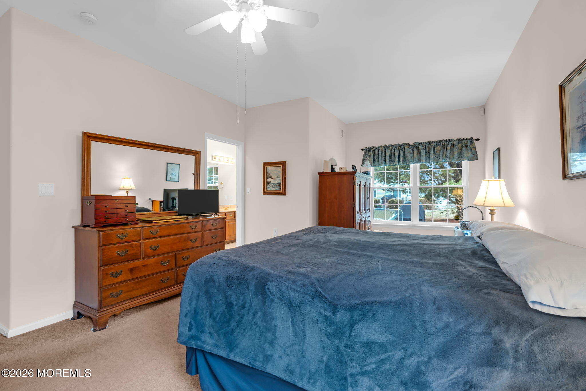 17 Rochford Drive Manchester Township, NJ 08759 - Photo 29 of 55 a bedroom with a large bed and a dresser