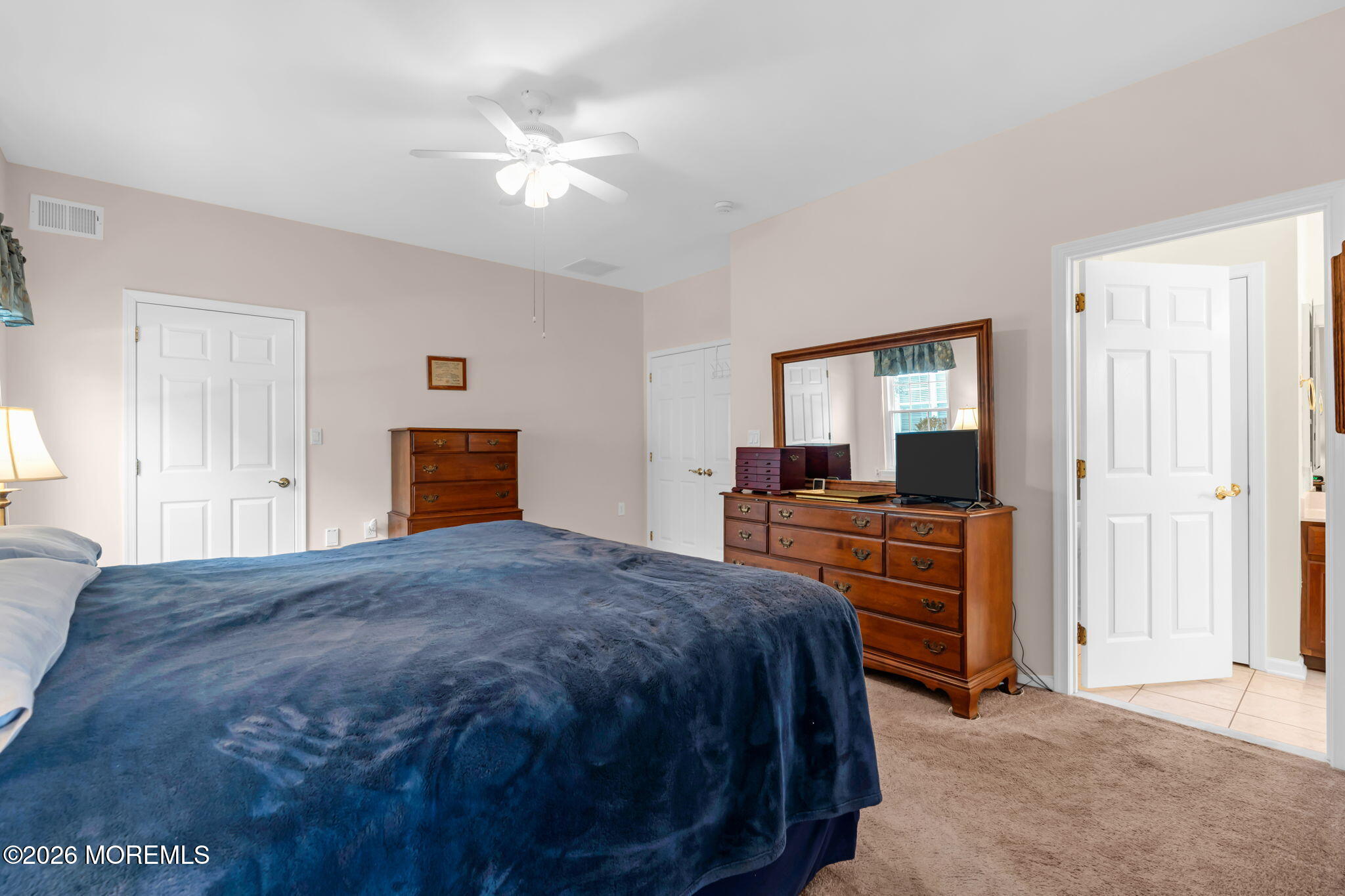 17 Rochford Drive Manchester Township, NJ 08759 - Photo 30 of 55 a bed room with a bed and a television