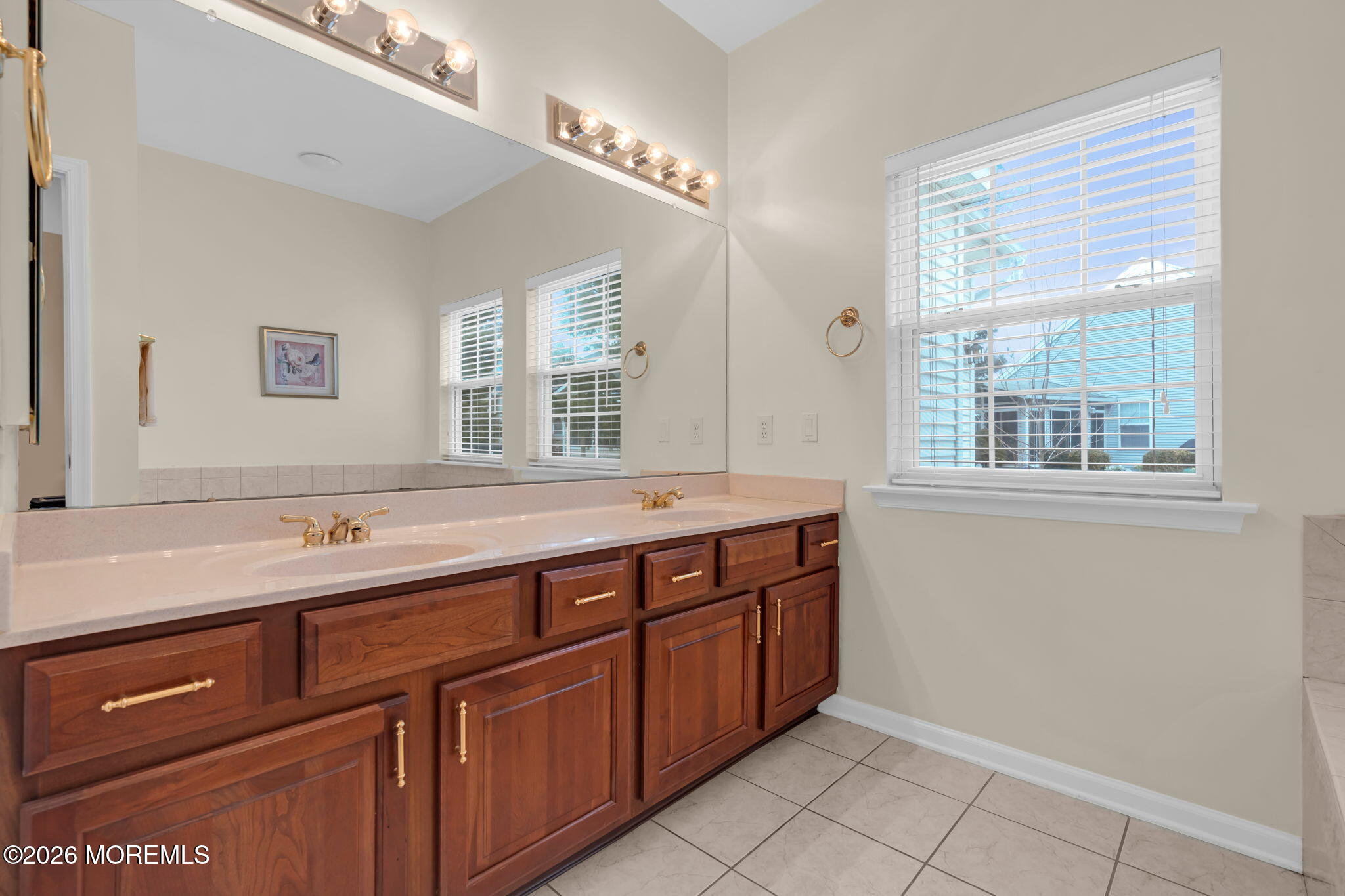 17 Rochford Drive Manchester Township, NJ 08759 - Photo 31 of 55 a spacious bathroom with a granite countertop sink and a large mirror