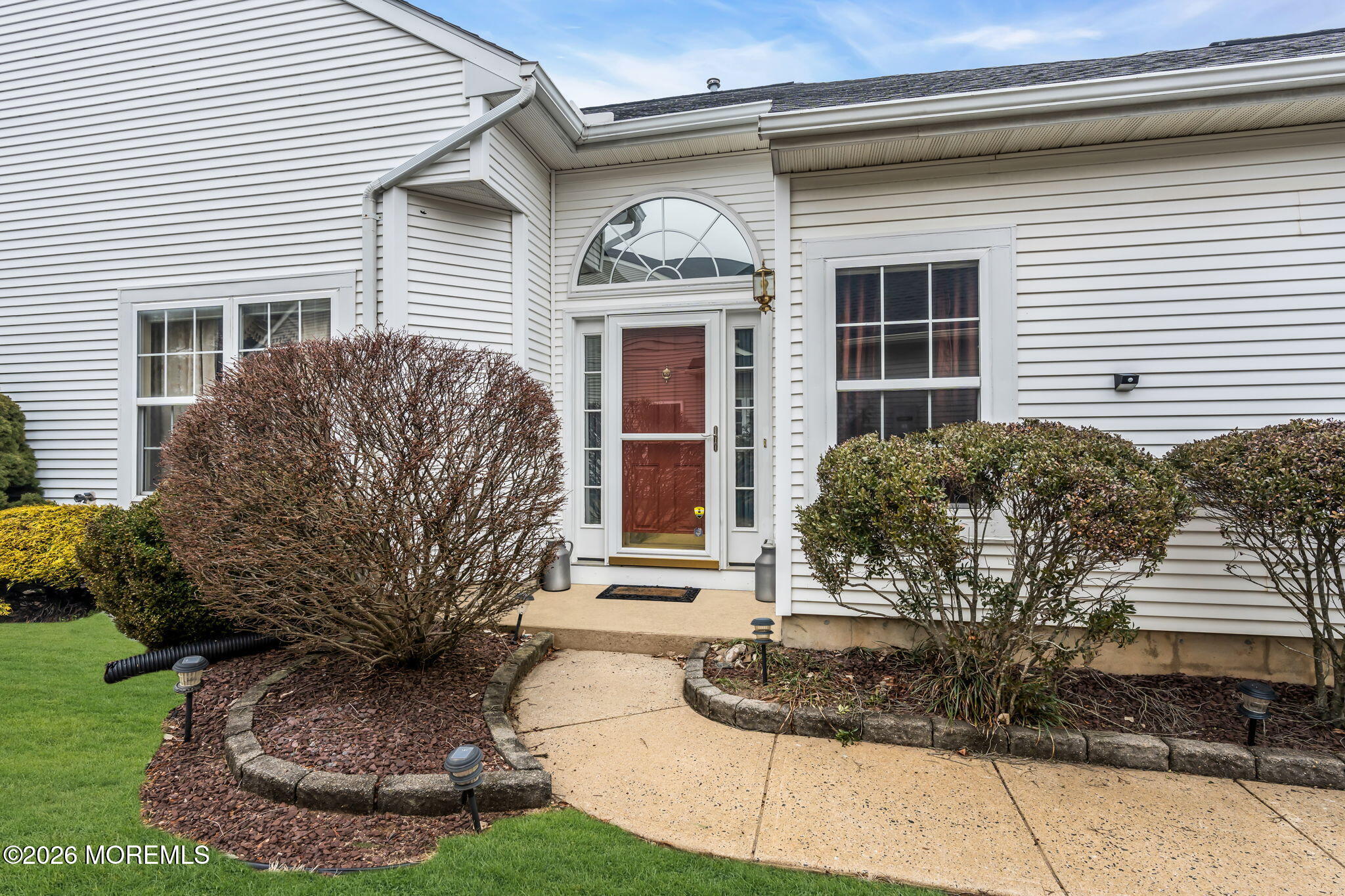 17 Rochford Drive Manchester Township, NJ 08759 - Photo 5 of 55 a front view of a house with garden