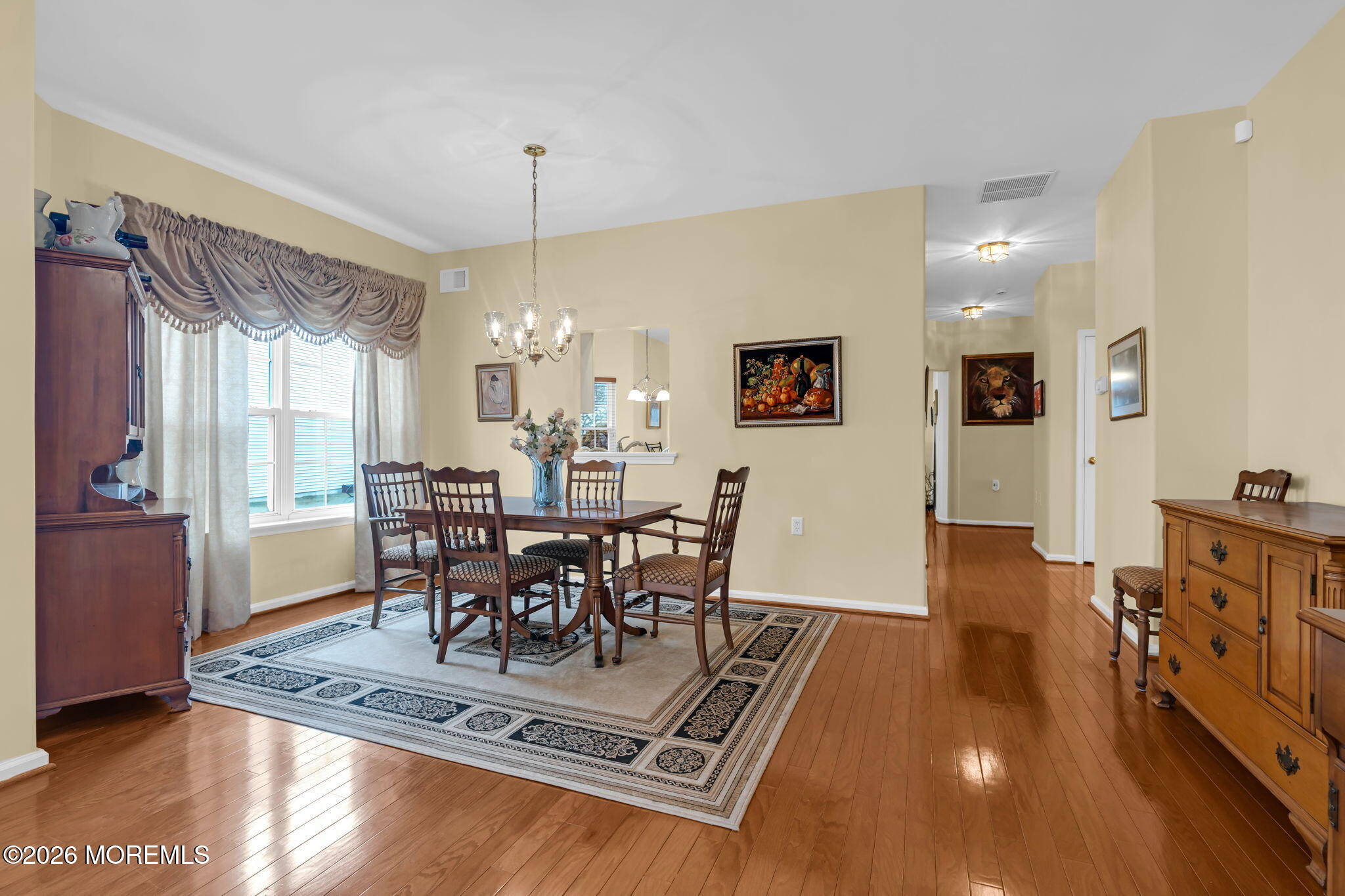 17 Rochford Drive Manchester Township, NJ 08759 - Photo 7 of 55 a view of a dining room with furniture window and wooden floor