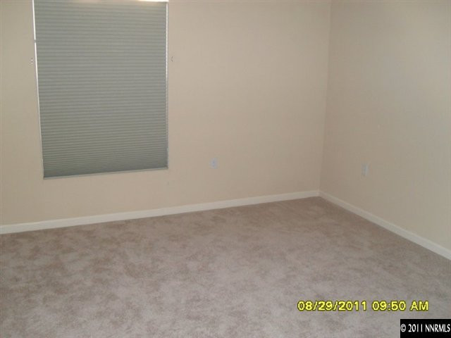 9050 Double R Boulevard, Unit 1812 Reno, NV 89521 - Photo 5 of 8 a view of an empty room