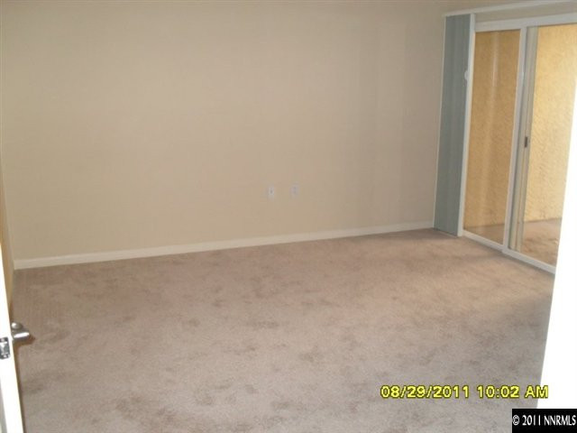 9050 Double R Boulevard, Unit 1812 Reno, NV 89521 - Photo 6 of 8 a view of an empty room