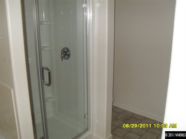 9050 Double R Boulevard, Unit 1812 Reno, NV 89521 - Photo 8 of 8 a bathroom with a shower
