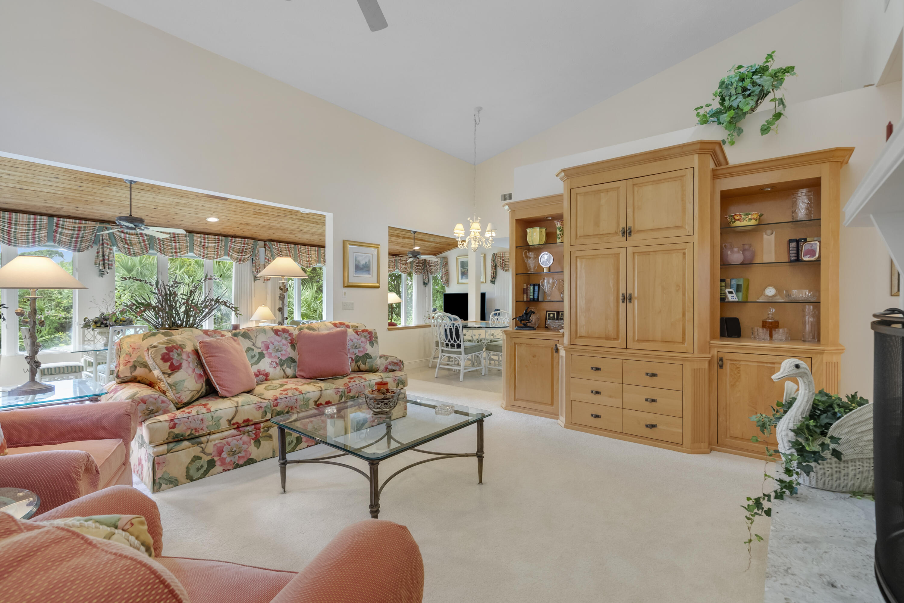 5011 Southeast Burning Tree Circle Stuart, FL 34997 - Photo 11 of 59 a living room with furniture and a window