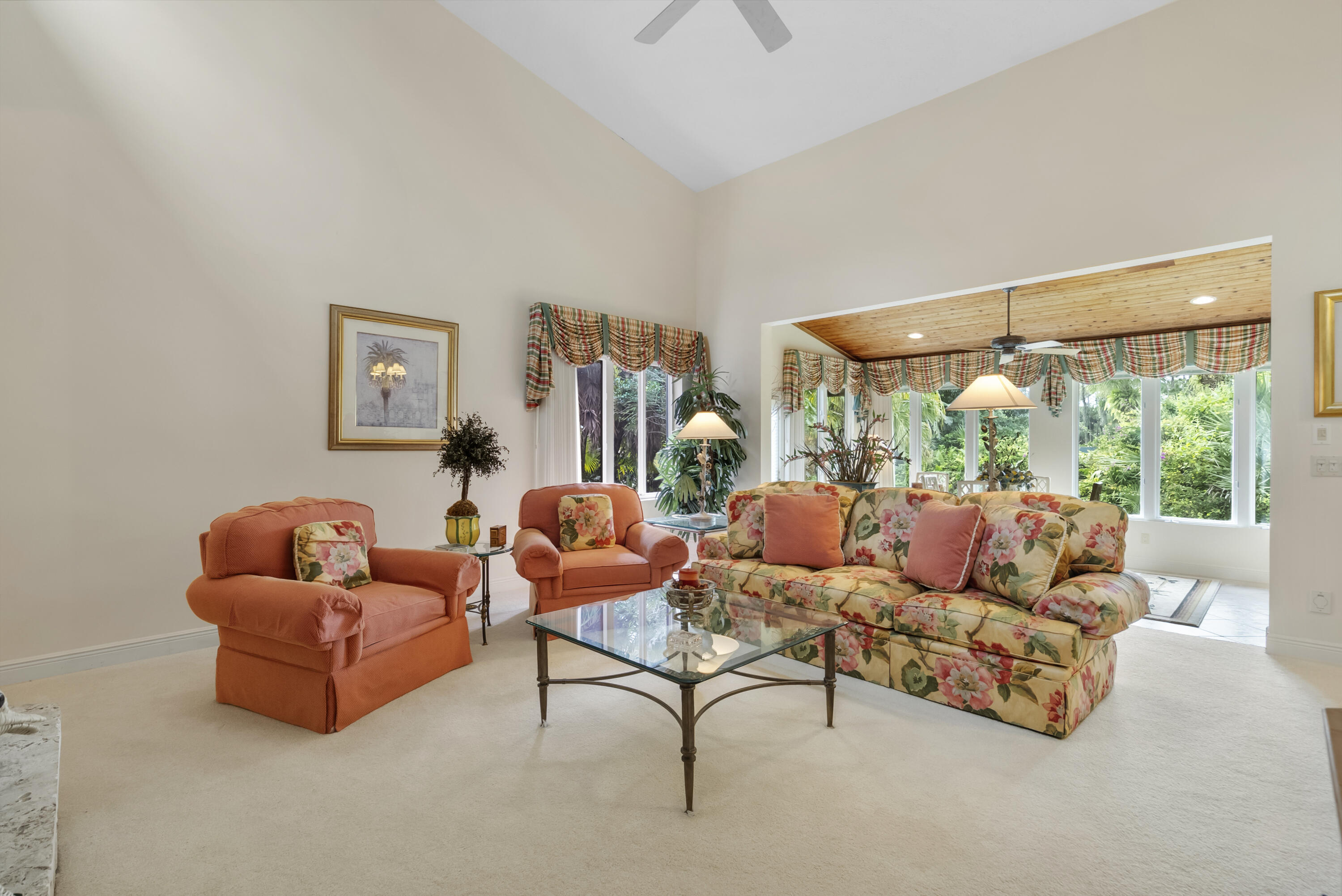 5011 Southeast Burning Tree Circle Stuart, FL 34997 - Photo 12 of 59 a living room with furniture and a large window