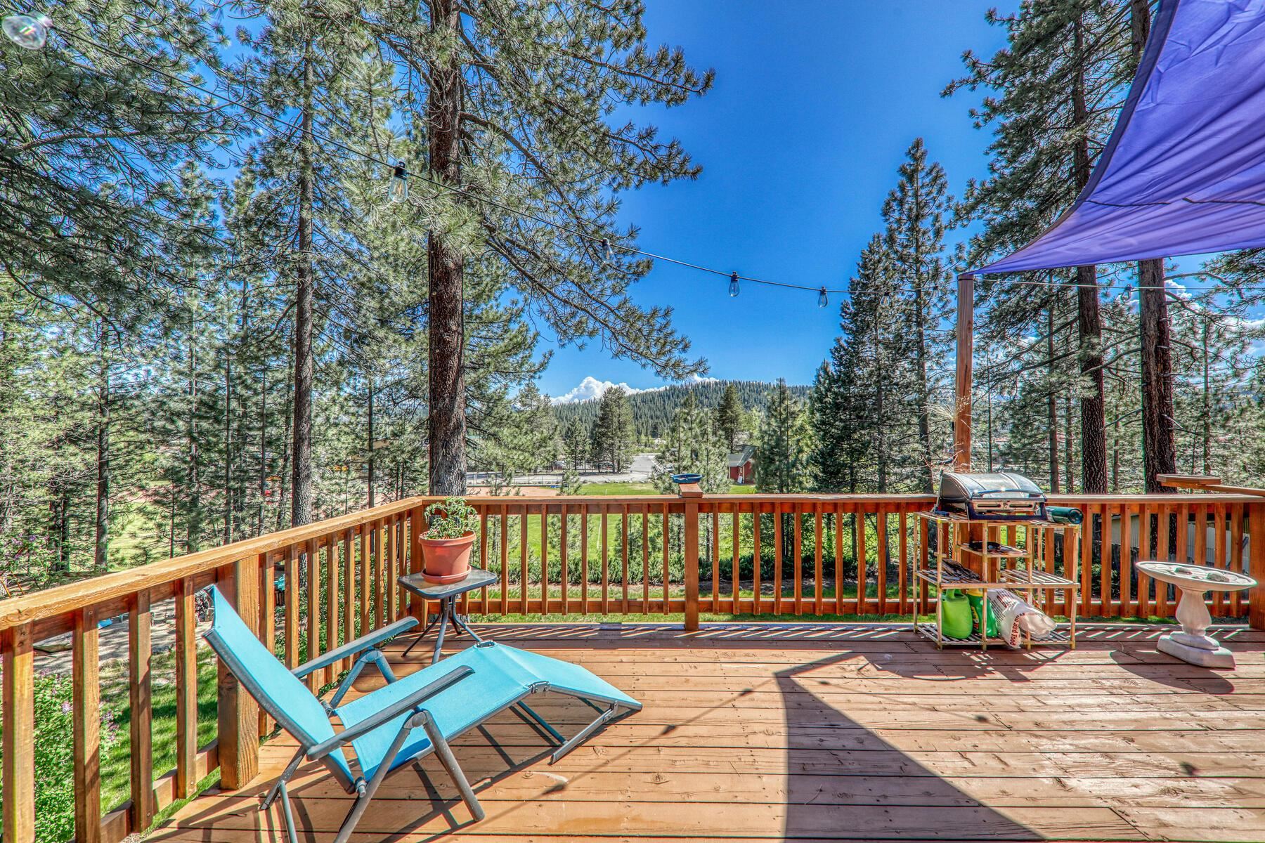 11629 Brook Lane Truckee, CA 96161 - Photo 14 of 28 a view of a wooden deck with furniture