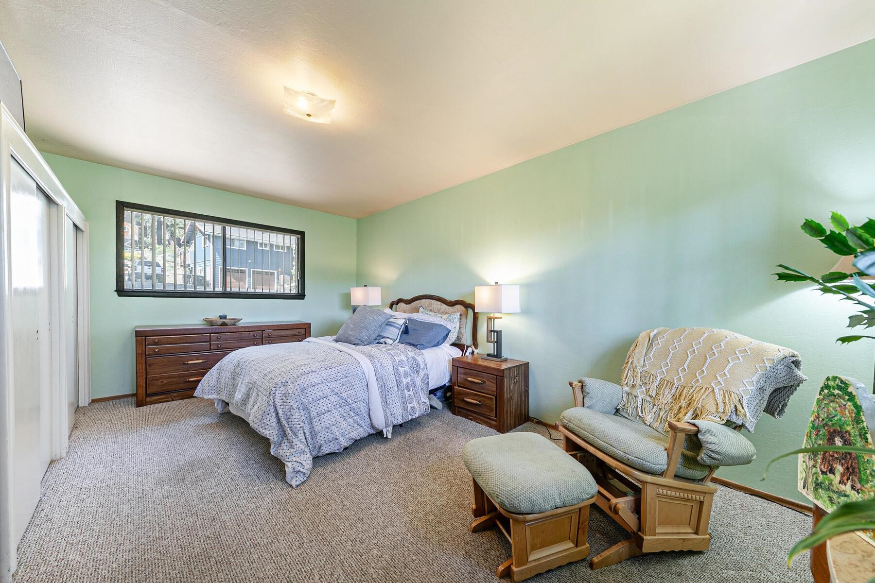 11629 Brook Lane Truckee, CA 96161 - Photo 18 of 28 a bedroom with a bed and window