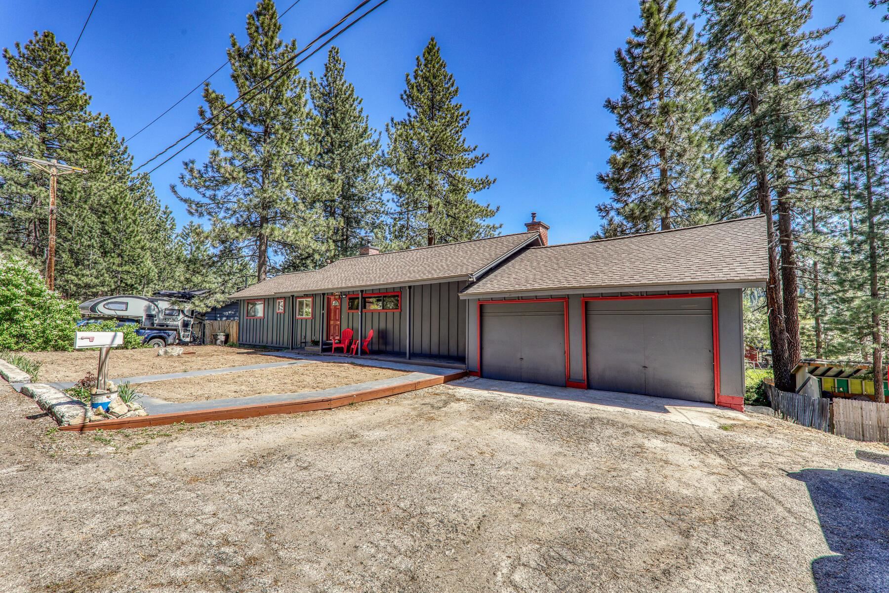 11629 Brook Lane Truckee, CA 96161 - Photo 27 of 28 a front view of a house with a yard and garage