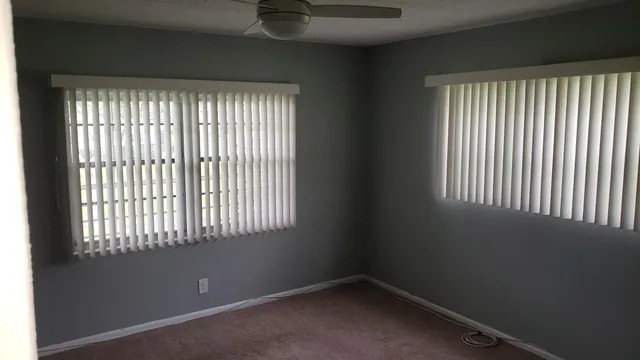 a bathroom with a toilet and a bathtub
